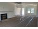 Living room with natural light, a fireplace, and a ceiling fan at 997 Oak Hollow St., Longs, SC 29568
