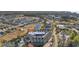 Beautiful aerial view of the condos in a neighborhood with a small lake and several other condo buildings at 1101 Possum Trot Rd. # C-303, North Myrtle Beach, SC 29582