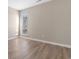 Neutral bedroom with wood flooring and a window with blinds at 1101 Possum Trot Rd. # C-303, North Myrtle Beach, SC 29582