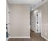 Hallway featuring neutral walls and wood-look flooring at 1101 Possum Trot Rd. # C-303, North Myrtle Beach, SC 29582