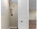 Laundry room with hook ups and open shelving for storage at 1101 Possum Trot Rd. # C-303, North Myrtle Beach, SC 29582