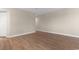 Neutral living room with wood flooring and white baseboards at 1101 Possum Trot Rd. # C-303, North Myrtle Beach, SC 29582