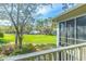 Balcony with a picturesque view of the golf course and lush greenery at 110-4 White Tail Way # 4, Pawleys Island, SC 29585