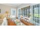 Sunlit dining room with table, and access to an outdoor patio via sliding glass doors at 110-4 White Tail Way # 4, Pawleys Island, SC 29585