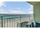 Enjoy ocean views from the balcony with chairs overlooking the beach and ocean at 1105 S Ocean Blvd. # 1224, Myrtle Beach, SC 29577
