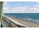 Enjoy the beachfront view from the condo balcony, overlooking the ocean and sandy beach at 1105 S Ocean Blvd. # 1224, Myrtle Beach, SC 29577