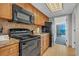 Efficient kitchen with modern appliances and cozy dining area at Coral Beach Resort at 1105 S Ocean Blvd. # 1224, Myrtle Beach, SC 29577