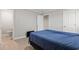 Neutral bedroom featuring a doorway to a restroom, and tile flooring at 1136 Knotty Branch Rd., Conway, SC 29527