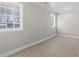 Neutral bedroom with two large windows offering plenty of natural light and views of the outdoors at 1136 Knotty Branch Rd., Conway, SC 29527