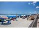 A sunny beach scene with colorful umbrellas and lounge chairs, ideal for relaxation and enjoying coastal living at 1210 N Waccamaw Dr. # 408, Garden City Beach, SC 29576