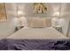 Bright and airy bedroom featuring a comfortable bed and beachy decor at 1210 N Waccamaw Dr. # 408, Garden City Beach, SC 29576