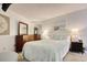 Cozy bedroom featuring a comfortable bed, matching nightstands, and beach-themed decor at 1210 N Waccamaw Dr. # 408, Garden City Beach, SC 29576
