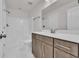 A bathroom with a single sink vanity and tile flooring throughout at 1279 Safe Haven Dr., Myrtle Beach, SC 29579