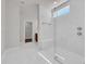 Bright, modern bathroom featuring a tiled shower with glass door and vanity in the background at 1279 Safe Haven Dr., Myrtle Beach, SC 29579