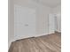 This bedroom features hardwood floors, ample closet space, and a neutral paint scheme at 1279 Safe Haven Dr., Myrtle Beach, SC 29579