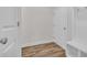 Hallway features wood-look floors, neutral paint, and a coat rack and storage at 1279 Safe Haven Dr., Myrtle Beach, SC 29579