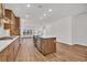 Spacious kitchen featuring stainless steel appliances, large island, and open layout at 1279 Safe Haven Dr., Myrtle Beach, SC 29579