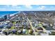 Scenic aerial view of coastal neighborhood with marshland on one side and ocean on the other side at 134 Vista Dr., Murrells Inlet, SC 29576