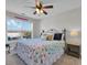 Comfortable bedroom with patterned bedding and side table at 134 Vista Dr., Murrells Inlet, SC 29576