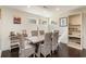Elegant dining room with a vaulted ceiling, stylish decor, and comfortable seating for Gathering meals at 135 Chapel Creek Rd. # 41, Pawleys Island, SC 29585