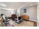 Bright room features a bedroom, seating area, and walk-in closet with hardwood floors and a colorful rug at 135 Chapel Creek Rd. # 41, Pawleys Island, SC 29585