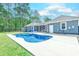 Spacious backyard with a refreshing pool, lush lawn, and a privacy fence at 138 Cooper River Rd., Myrtle Beach, SC 29588