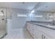 Modern bathroom featuring a double vanity with granite countertop and walk-in shower with glass doors at 138 Cooper River Rd., Myrtle Beach, SC 29588