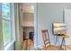Bedroom view featuring a closet door, a chair, a TV and a window with bright daylight at 138 Cooper River Rd., Myrtle Beach, SC 29588