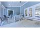 Covered patio with outdoor seating, double doors, and a view of the interior at 138 Cooper River Rd., Myrtle Beach, SC 29588