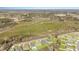 Aerial view showcasing the neighborhood and surrounding wooded area at 1470 Burriss Rd., Conway, SC 29526