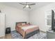 Comfortable bedroom offers a cozy ambiance, with natural light and neutral tones, offering a calming retreat at 1470 Burriss Rd., Conway, SC 29526