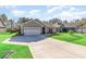 Charming home featuring a two-car garage and well manicured lawn at 1470 Burriss Rd., Conway, SC 29526