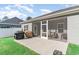 Inviting screened-in patio with outdoor seating and grilling area, perfect for entertaining at 1470 Burriss Rd., Conway, SC 29526