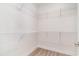 Ample storage with wire shelving in this walk-in closet features vinyl floors and white walls at 1470 Burriss Rd., Conway, SC 29526