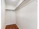 Walk-in closet with wood-look floors and shelving for ample storage at 1470 Turkey Ridge Dr. # D, Myrtle Beach, SC 29575