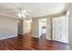Open-concept living area with wood floors connecting to the kitchen and dining spaces at 1470 Turkey Ridge Dr. # D, Myrtle Beach, SC 29575