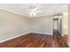 Neutral living room with wood floors, ample natural light, and a view down the hallway at 1470 Turkey Ridge Dr. # D, Myrtle Beach, SC 29575