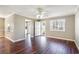 Bright living area featuring wood flooring and access to the kitchen, dining, and outdoor spaces at 1470 Turkey Ridge Dr. # D, Myrtle Beach, SC 29575