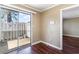 Bright and airy living space featuring sliding glass doors to outdoor patio and hardwood floors at 1470 Turkey Ridge Dr. # D, Myrtle Beach, SC 29575