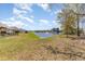 Enjoy peaceful water views from the backyard of this home, featuring a tranquil pond and verdant surroundings at 1470 Turkey Ridge Dr. # D, Myrtle Beach, SC 29575