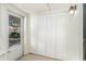 Storage unit with paneled closet doors, an exterior light, and tiled floors at 1470 Turkey Ridge Dr. # D, Myrtle Beach, SC 29575