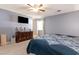 Bedroom features large window, carpeted floors, ceiling fan and mounted TV at 150 Brookgate Dr., Myrtle Beach, SC 29579