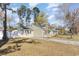 Lovely exterior view of a single story home with a large yard and a white picket fence at 150 Brookgate Dr., Myrtle Beach, SC 29579