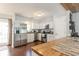 Bright kitchen featuring stainless steel appliances, white cabinets, and a breakfast bar for casual dining at 150 Brookgate Dr., Myrtle Beach, SC 29579