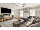 Inviting living room featuring a modern fireplace, hardwood floors, and a comfortable sectional sofa at 150 Brookgate Dr., Myrtle Beach, SC 29579