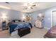 Cozy main bedroom with ceiling fan and side tables at 150 Brookgate Dr., Myrtle Beach, SC 29579