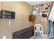 Tan mud room with a trunk, chair, music player, fan, and wall decor at 150 Brookgate Dr., Myrtle Beach, SC 29579
