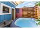 Private outdoor space with hot tub and string lights at 150 Brookgate Dr., Myrtle Beach, SC 29579
