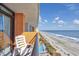 Exterior balcony offers gorgeous beach views and provides a relaxing place to lounge at 1501 S Ocean Blvd. # 1042, Myrtle Beach, SC 29577