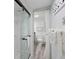 Clean bathroom with a glass-enclosed shower, and a separate vanity area offering ample space at 1501 S Ocean Blvd. # 1042, Myrtle Beach, SC 29577